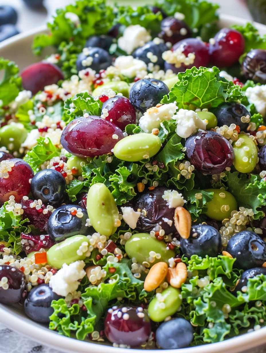 A bowl of salad with twelve different types of food.