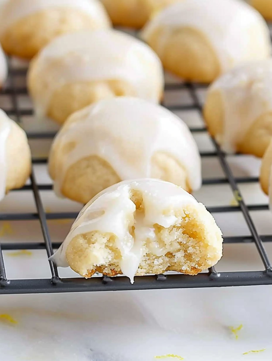 A cookie with a bite taken out of it.