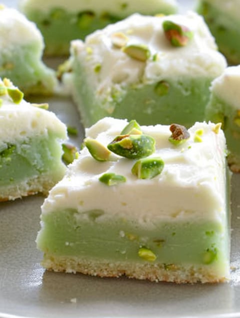 A close up of a pistachio cookie bar.