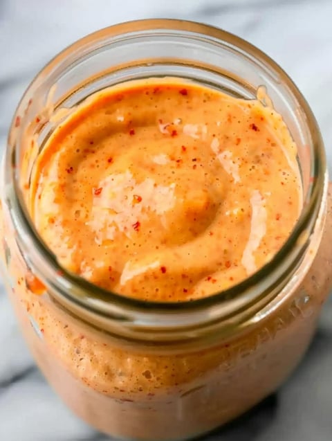 A jar of bang bang sauce.