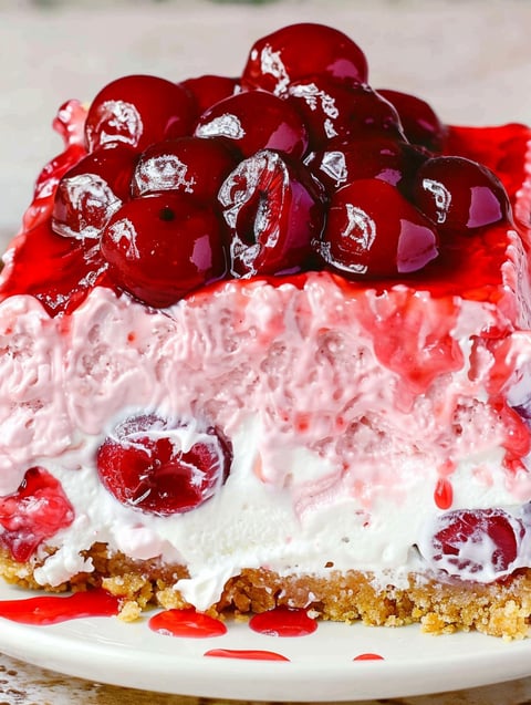 A slice of cherry cheesecake lush.