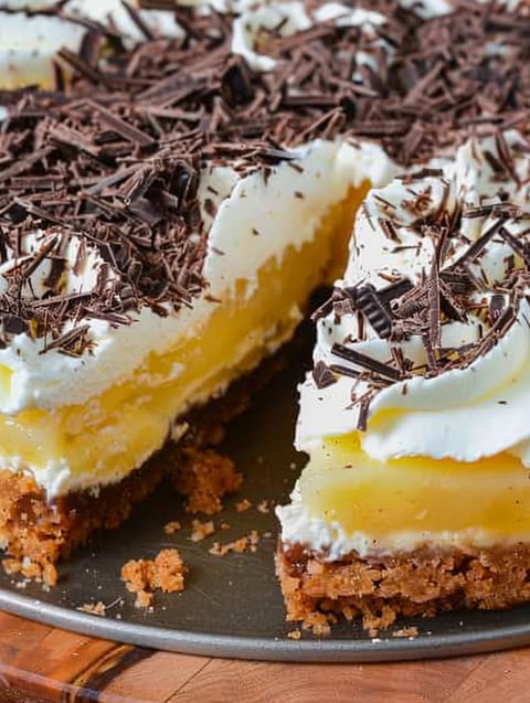 A slice of Swedish apple cake with chocolate chips.